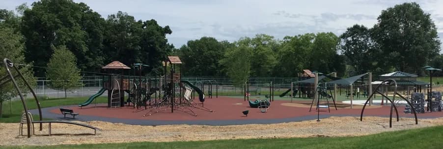 Playground equipment and swings at East Goshen Township Park